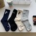 Zhuoxinder 1 Pair Autumn Winter Unisex Socks Letter Print Moisture Absorption Solid Color Korean Middle Tube Socks For Running-Black_maomaolike.com