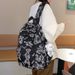 Graffiti Reflective Women 2026 New Niche Design For Middle And High School Students Casual Large Capacity Backpack_maomaolike.com