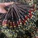 In Stock Handmade Red And Yellow Five Emperors Coin Cloud Green Bead Rope Keychain Accessories Manufacturer Wholesale_maomaolike.com