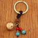 Fashion Pendant Baifu Small Cylinder Key Car Keychain Handmade Woven Blue Bead Hanging Rope Unisex_maomaolike.com