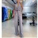 Women's clothing fashion temperament sleeveless hollow shirt high waist wide leg pants two-piece suit_maomaolike.com