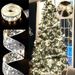 A Christmas Tree With 32 Feet Of Ribbon_maomaolike.com