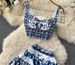 Women Two piece set of short strapless suspender with three-dimensional chest pad and pleated skirt_maomaolike.com