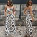 Women's clothing new printed sleeveless suspender short top + long wide leg pants_maomaolike.com