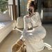 Women's Clothing hollow knitted top skirt two piece suit fashionable and age reducing temperament early spring wear a complete set_maomaolike.com