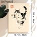 Playful Cat Painting Poster, Elegant Chinese Ink Wash Style Poster, Delicate Black-and-white Cat With Raised Paw, Brings Gentle Artistic Vibe For_maomaolike.com