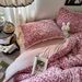 Wholesale French Leopard Print Pom-Pom Lace Milk Velvet Autumn Winter Double-Sided Warm Coral Fleece Four-Piece Set_maomaolike.com