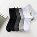 Solid color men's classic black and white socks men's business tube cotton socks cotton socks breathable comfortable invisible socks_maomaolike.com