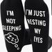 Unisex Black and white dotted eyelashes sleeping face socks i'm not sleeping just resting_maomaolike.com