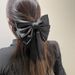 Exquisite big bow high-grade rhinestone hairpin hairband simple diamond-studded temperament spring clip hairpin ponytail clip for women_maomaolike.com