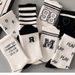 Unisex Socks Female ins Hipster high appearance level Mid-tube socks Student Sport Mid-tube socks couple socks_maomaolike.com