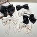 Exquisite big bow high-grade rhinestone hairpin hairband simple diamond-studded temperament spring clip hairpin ponytail clip for women_maomaolike.com