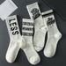 Unisex White Stockings For Men Student Sports Socks For Men Instagram Fashion All-match Mid-tube Basketball Socks For Men_maomaolike.com